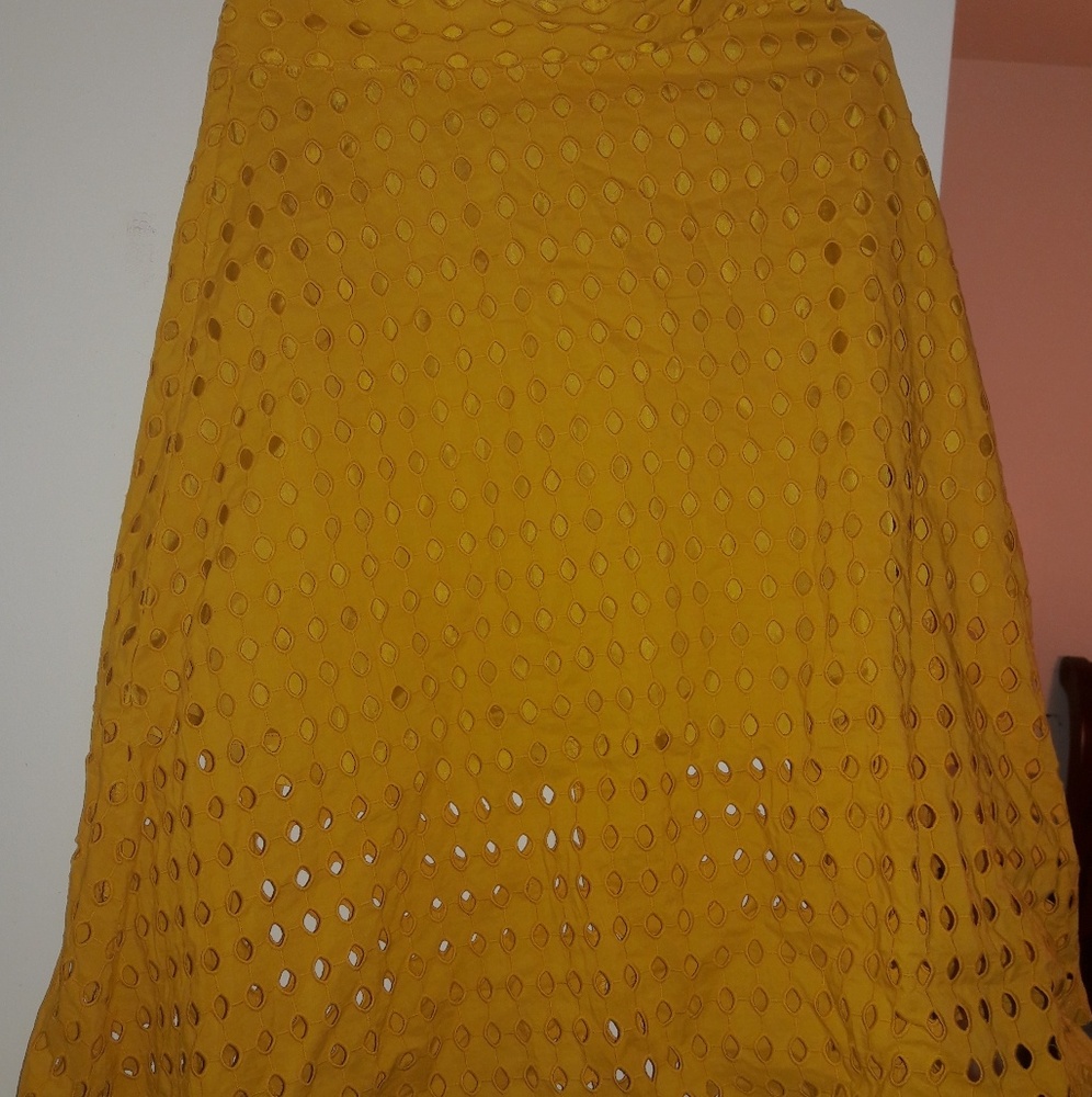 Yellow skirt with circle hole pattern
